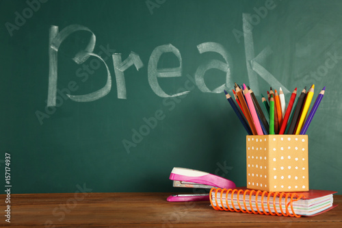 Fényképezés School stationery and "Break" text on chalkboard