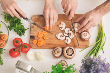 Family Cooking Meal Preparation Together Cutting Ingredients 