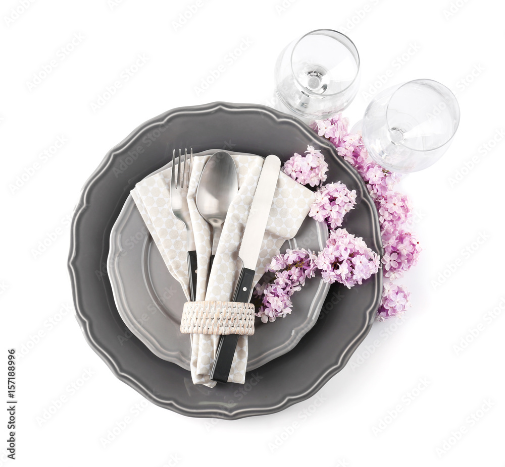 Beautiful festive table setting with lilac flower decor on white background