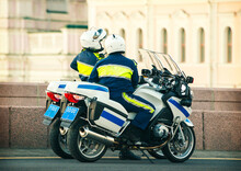 Traffic Policemen On Their Patrol Motorcycles