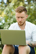 © antgor - Man freelancer working with laptop in a nature