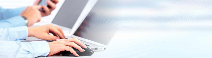 Fototapete - Hands typing on computer laptop.