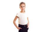 Fototapeta Dziecięca - Little girl in white T-shirt and black skirt