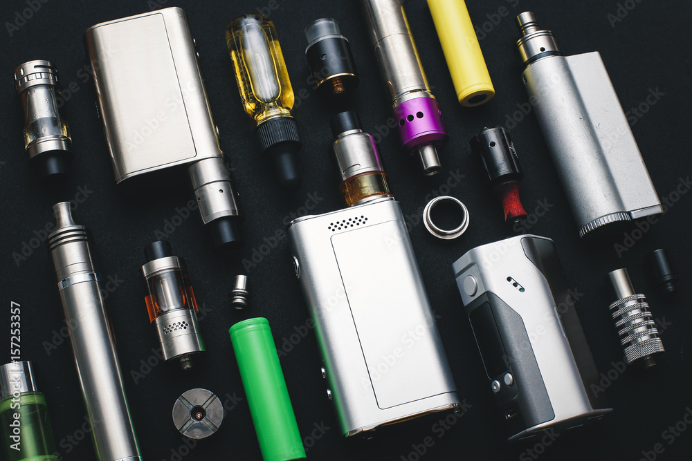 vape mod parts Popular vaping device mod.Upgrade for modern vaporizer e-cig device,spare parts.New device model,micro coil clearomizer.Quit smoking nicotine cigarette,start vaping safe ecig Stock Photo Do Oil Cartridges Go Regular Flavor:Orange Mint Savers