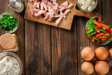 Ingredients for preparing omelette with bacon and vegetables