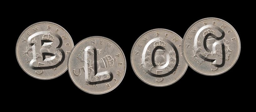 BLOG – Coins on black background