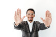 © Drobot Dean - Young african man showing hands.