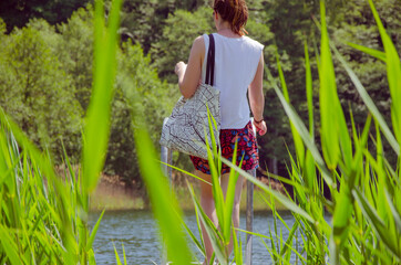 Woman wears tote bag