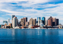 Panoramic View Of Boston Skyline, View From Harbor, Skyscrapers In Downtown Boston, Cityscape Of The Massachusetts Capital, USA