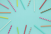 Drinking Straws For Party On Blue Pastel Background With Copy Space.