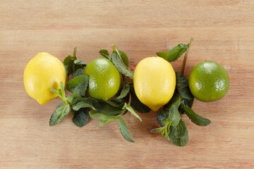 Fresh leaves of green mint with lime and lemon