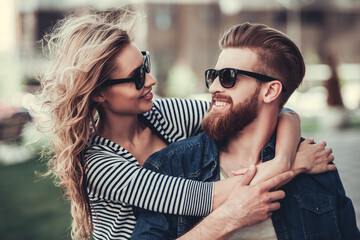 Wall Mural - Couple walking in city