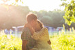 © satura_ - Young attractive couple in love kissing in summer nature