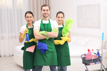 Wall Mural - Cleaning service team at work in bedroom