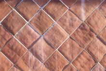 Background Of Harmonic Cotto Tiles In Red