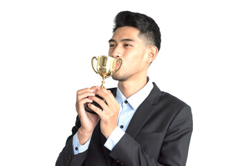 Businessman kissing a trophy because she has won the competition