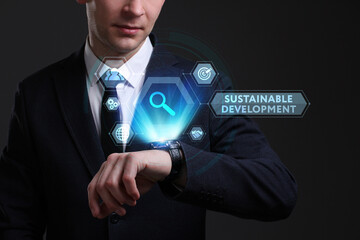 Business, Technology, Internet and network concept. Young businessman working on a virtual screen of the future and sees the inscription: Sustainable development