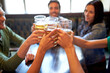 © Syda Productions - happy friends drinking beer at bar or pub
