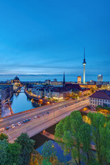 Wall Mural - The historic center of Berlin with the famous Television Tower after sunset