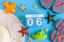 June 6th. Image Of June 6 Calendar On Blue Background With Summer Beach, Traveler Outfit And Accessories. Summer Day