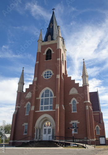 Fotografie, Obraz Gothic style Catholic Church in Park, Kansas, US, 2016.