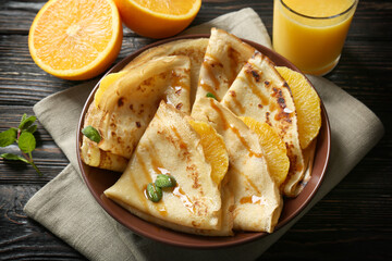 Canvas Print - Tasty pancakes with orange slices on plate