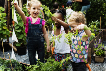 Sticker - Group of kindergarten kids learning gardening outdoors