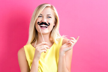 Sticker - Young woman holding paper party sticks