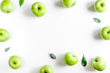 Wall Mural - Organic fruits with green apples mock up on white background top view