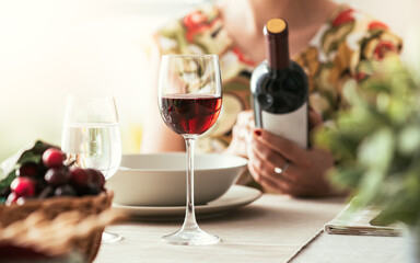 Wall Mural - Woman reading a wine label