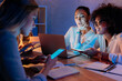 © LIGHTFIELD STUDIOS - young multiethnic businesswomen working with digital devices at home office