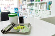 © Voy_ager - Drug prescription for treatment medication. Pharmaceutical medicament, cure in container for health with counter store table pharmacy background