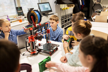 Wall Mural - happy children with 3d printer at robotics school