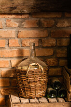 Wine Cellar Interior With Old Flask