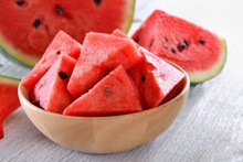 Water Melon In Wood Bowl On Table