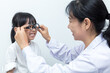 Leinwandbild Motiv Asian Little Chinese Girl Doing Eyes Examination by ophthalmologist