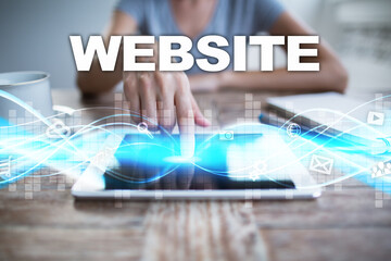 Wall Mural - Woman using tablet pc, pressing on virtual screen and selecting website.