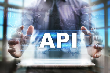 businessman using tablet pc and selecting api.
