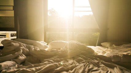 The Sun shines through window in the morning.