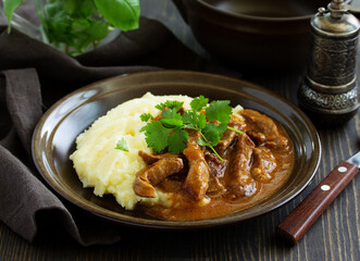 Wall Mural - Meat sauce goulash with mashed potatoes.