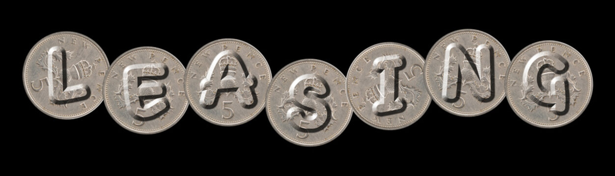 LEASING – Coins on black background