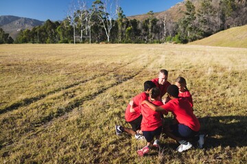 Wall Mural - trainer instructing kids in the boot camp