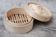Isolated Empty Round Steamer Bamboo Basket Or Crate