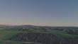 Aerial view over Tuscany hills landscape at sunset