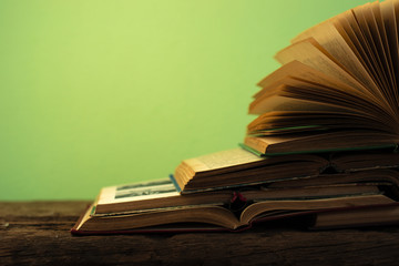 Poster - Books on an old wooden table