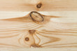 Wood coarse texture with knot surround for wallpaper, background.  Untreated pine texture.