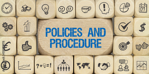 Photographie  Policies and Procedure / Würfel mit Symbole