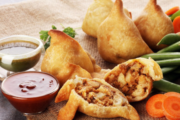 Indian special traditional street food punjabi samosa or Coxinha, Croquete and other Fried Brazilian Snacks