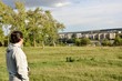 © st_fox - A man looks from the hill to the city