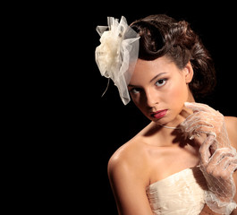  Bride in the original headdress. against a black background. Copy space